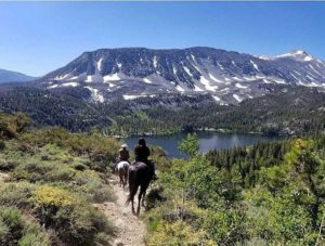 MonoCountyTourism-nett3rs_Horseback-riding-overlooking-Rock-Creek-Lake